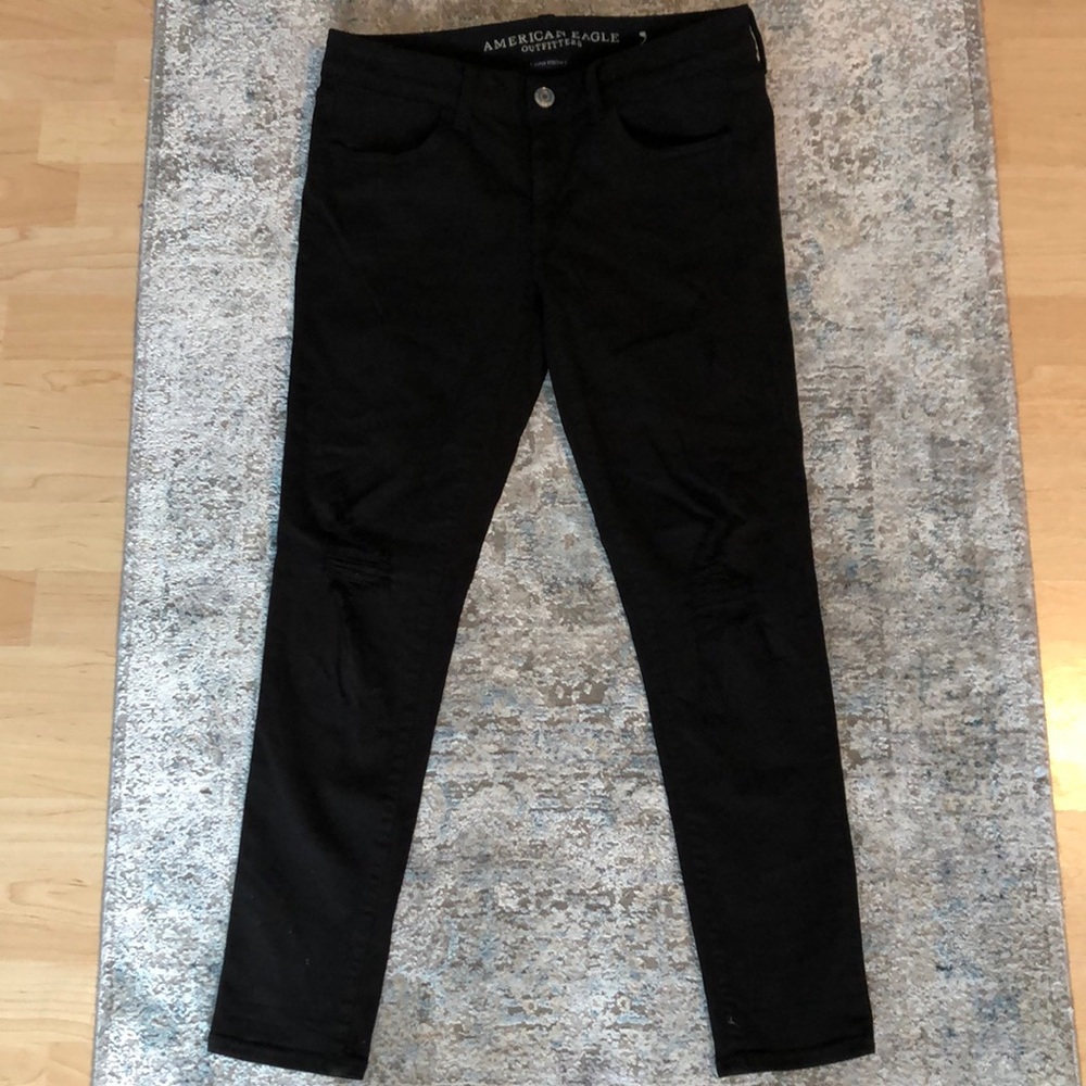 Black distressed jeans